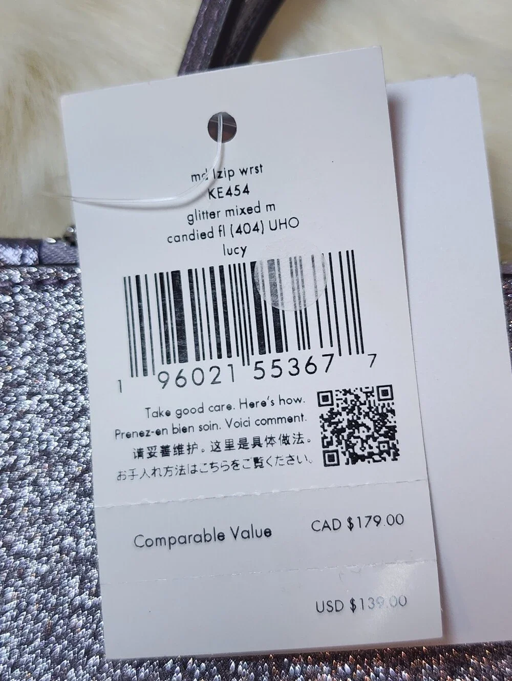 Kate Spade Lucy Silver Glitter Wristlet.